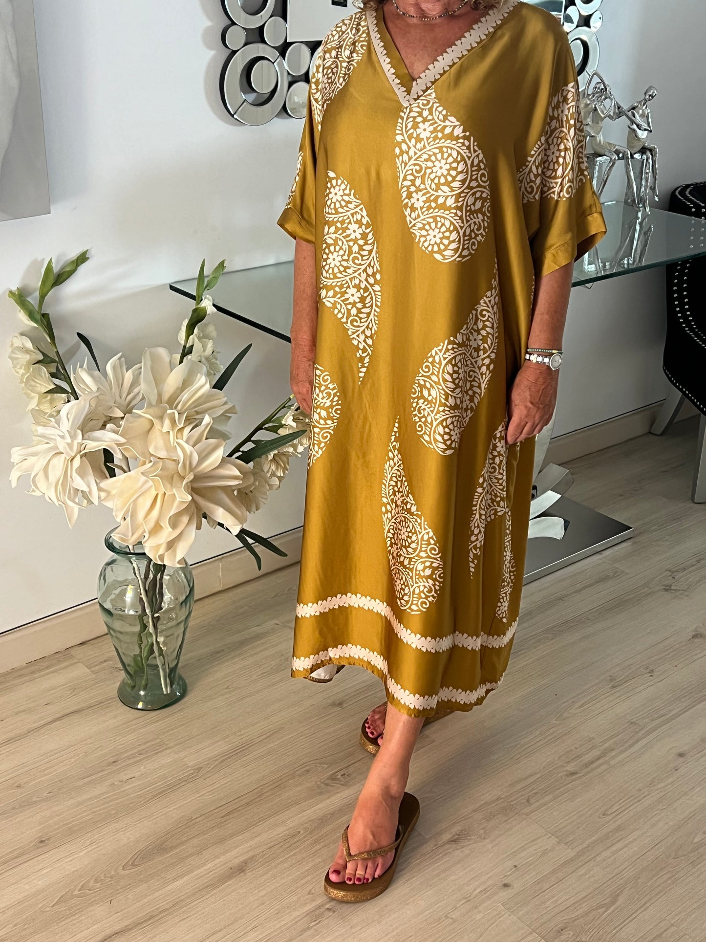 A Long V Neck Kaftan Dress